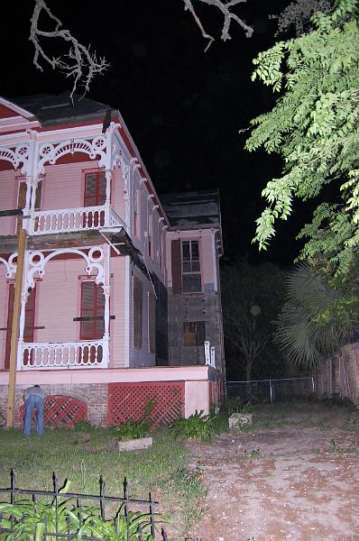 DSC_0266.JPG - James, Ottawa, Ontario, taken in Galveston Texas: Old house under reno, backin 1950's a murder took place on front steps (family fight ened in a shooting) If you zoom in on upper window and look in thre left top side you can see a face with hair eyes nose and mouth. The neighbour came over after I took pic and said when she walks by the house she gets a feeling of being watched from that window.